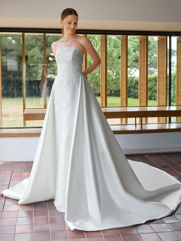 HAFSA by Pronovias 
Strapless column wedding dress with detachable overskirt