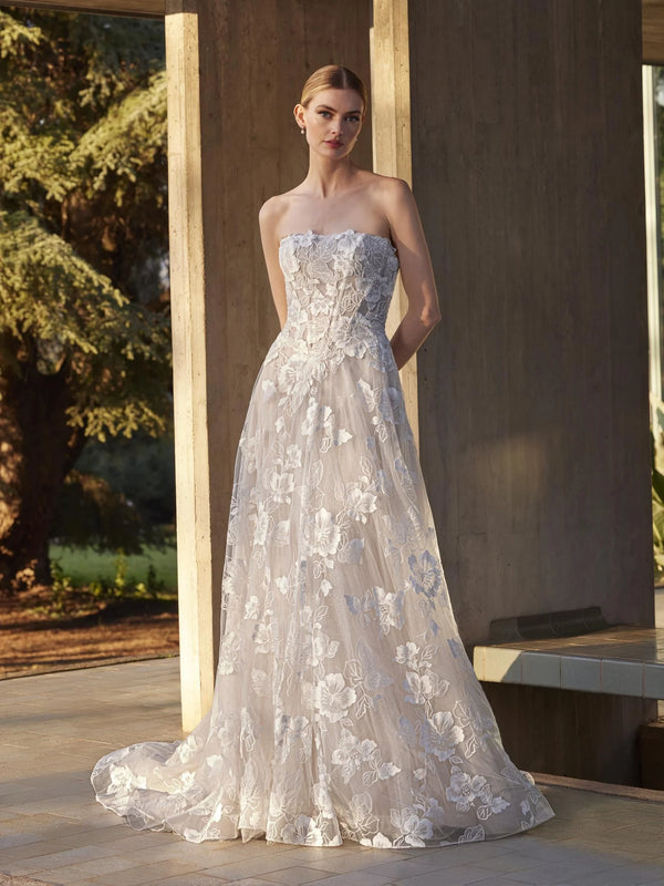 Woman wearing a strapless floral gown outdoors, Lace princess strapless wedding dress pronoias MENTA