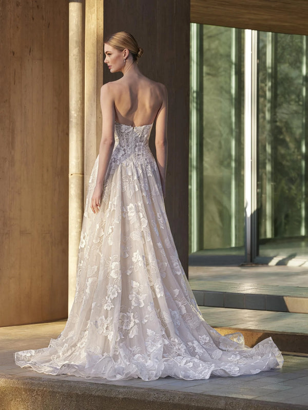 Woman wearing a strapless floral gown outdoors, Lace princess strapless wedding dress pronoias MENTA