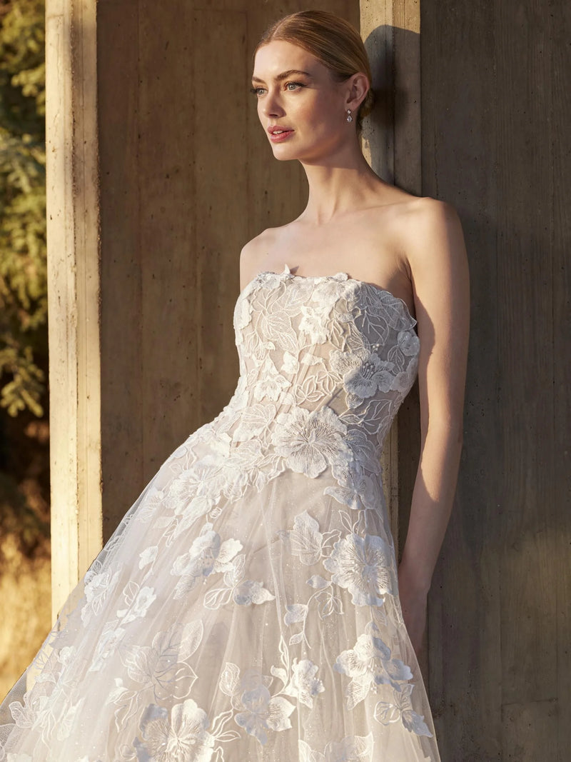 Woman wearing a strapless floral gown outdoors, Lace princess strapless wedding dress pronoias MENTA