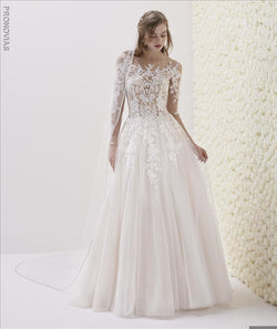 Wedding dress in embroidered tulle fabric with A-line cut 