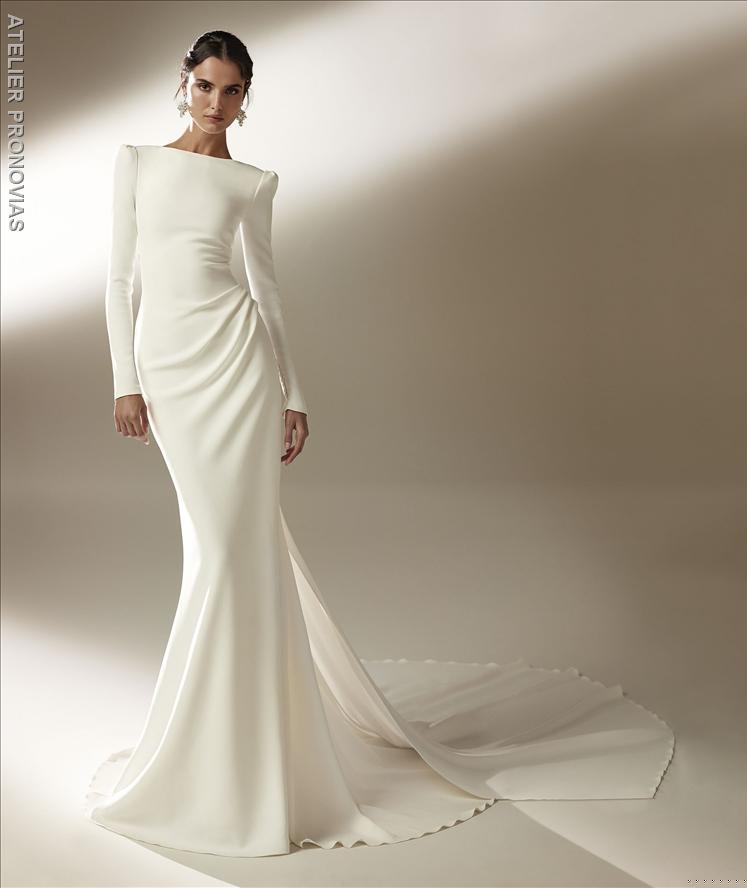 Mermaid wedding dress with bateau neckline and long sleeves in crepe 