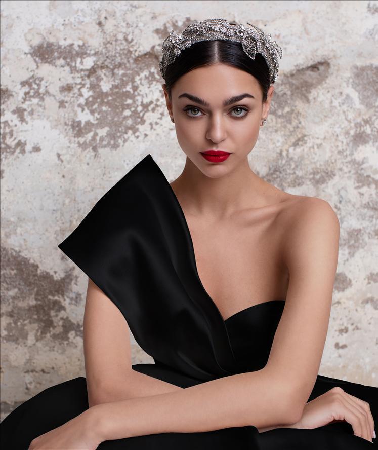 Pronovias Toutmaline dress with princess cut, asymmetrical neckline and cap sleeve one shoulder sparkle headpiece