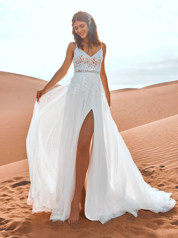 PRONOVIAS ALBATRE A-Line wedding dress in tulle and lace  This dress may be available in many other variations that are featured in the images of this style.  The fabric in this Pronovias Bridal style is Tulle and Lace and Sequins and Beads. Dress and Unlined Bodice and Dropped Sleeve